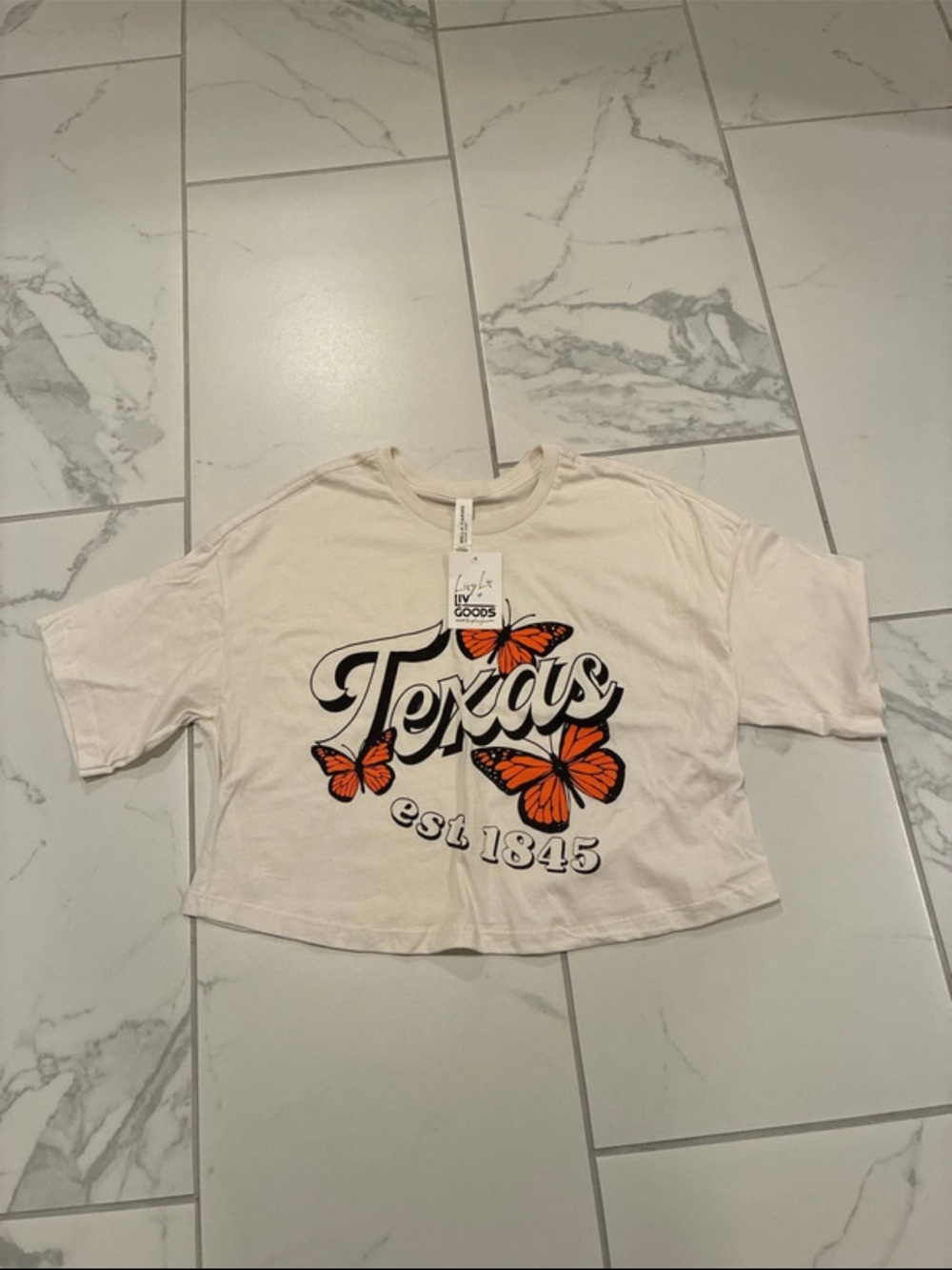 LivyLu Liv Goods Texas cream colored crop top size small
